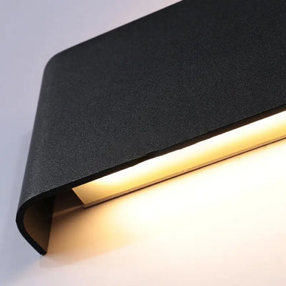 DecorBites™ modern metal wall sconces with black textured finish and warm led illumination for stylish lighting