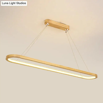 Modern minimalist wooden LED strip pendant light with warm glow, natural wood, metal cords, suitable for 110v-120v and 220v-240v