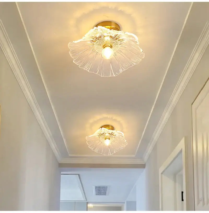 Clear glass flower-shaped ceiling lights with gold-toned metal base modern nordic e27 ceiling lights for home interiors