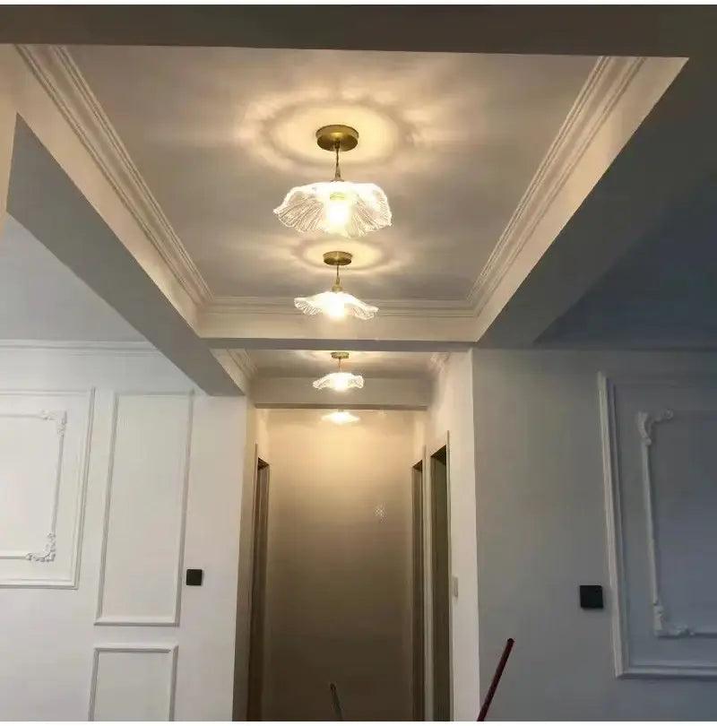 Three elegant translucent glass pendant e27 ceiling lights with gold-toned fixtures for modern home interiors