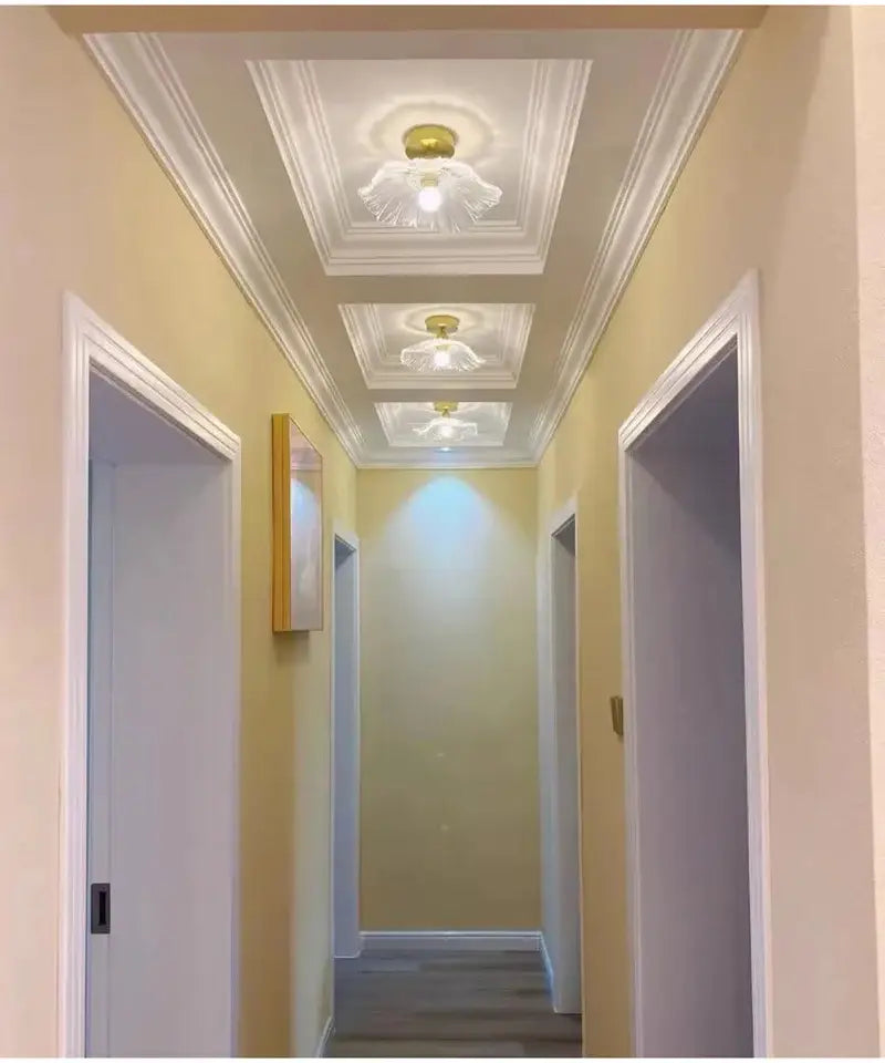 White ceiling medallion e27 ceiling lights with gold-finished center and translucent petal-like glass shades by decorbites