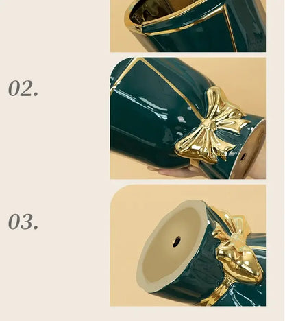 Deep teal ceramic vase with glossy finish and gold-trimmed edges featuring ornate bow for modern nordic home decor