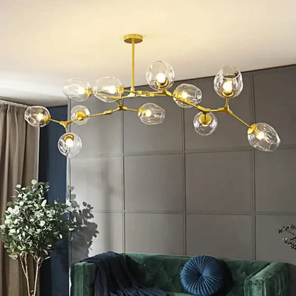Gold-toned DecorBites™ modern nordic glass chandelier with multiple clear glass globe shades perfect for ceiling lighting