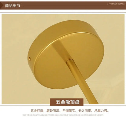 Gold-colored circular ceiling mount with sleek metallic finish and cylindrical stem for nordic lustre glass chandelier
