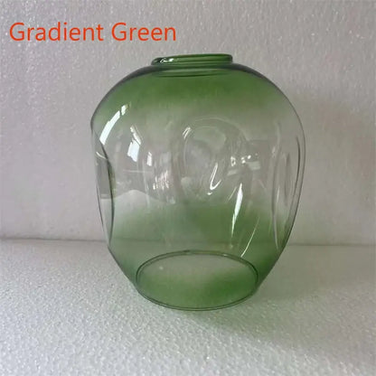 Modern nordic glass chandelier with gradient green glass lampshade featuring smooth rounded shape and embossed detailing