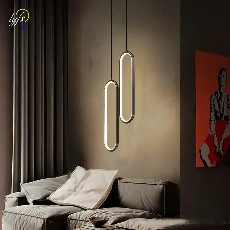 Decorbites modern nordic pendant light with sleek elongated oval shapes and warm glow for home decoration