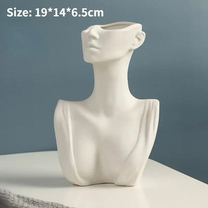 White ceramic nordic style ceramic vase shaped like a woman’s bust with open face and neck from DecorBites™