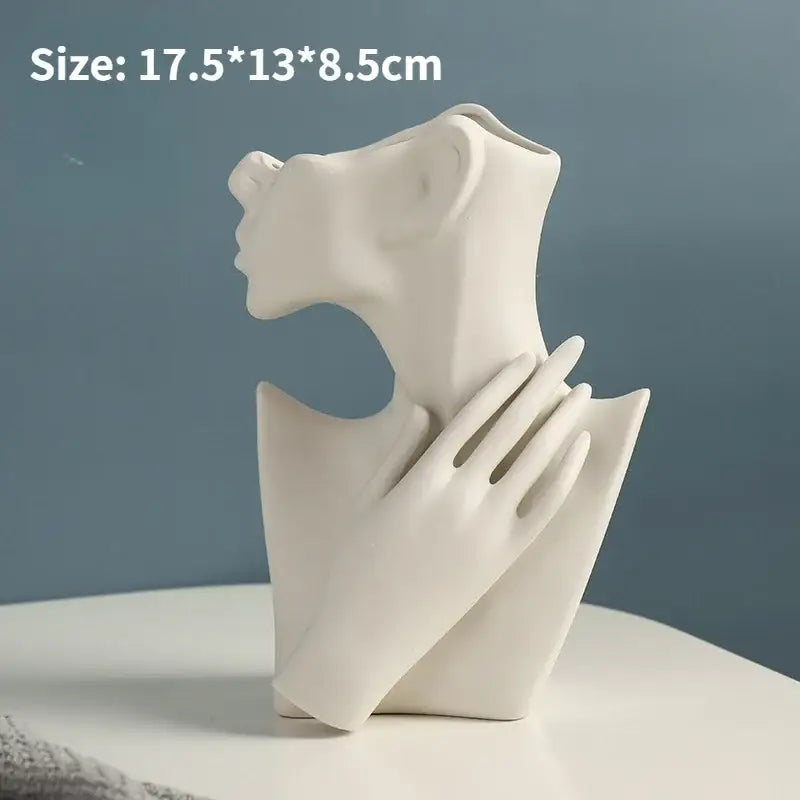 White ceramic nordic style ceramic vase shaped like a woman with hand resting on shoulder by decorbites modern design