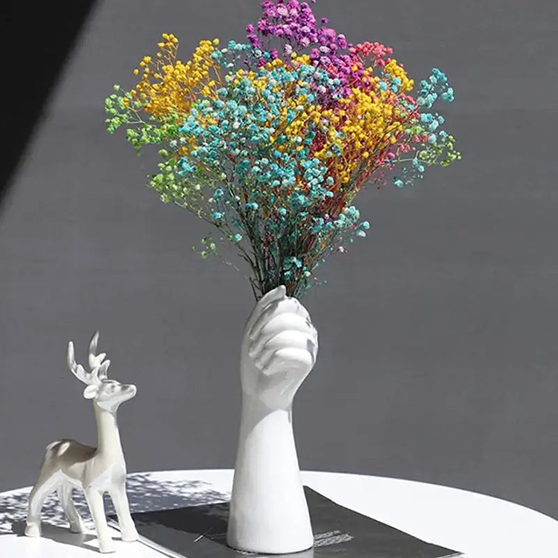 Decorbites modern nordic style white ceramic hand vase holding vibrant rainbow dried babys breath bouquet