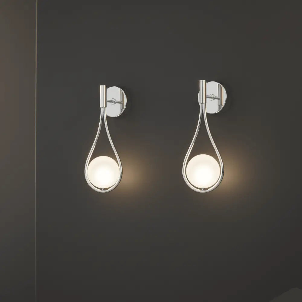 Pair of decorbites modern nordic wall lamps with chrome teardrop frames and frosted glass for livi wall lighting