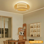 Warm-toned DecorBites™ rattan pendant light with woven bamboo texture and subtle geometric pattern for ceiling fan
