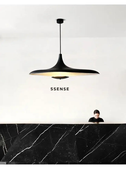 Black matte resin pendant lamp with warm glow and sleek design for dining room changeable light by decorbites