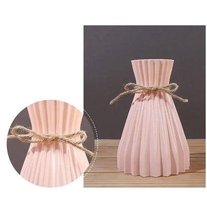 A blush pink pleated ceramic flower vase with rustic twine bow for modern simple dry flowers by decorbites