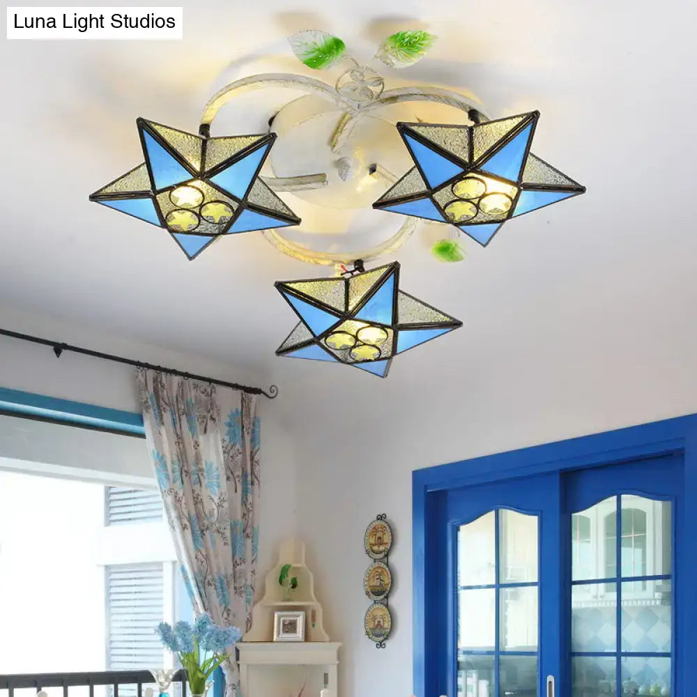 Three blue and gold star-shaped tiffany stained glass ceiling lights with black metal frames compatible with led incandescent fluorescent bulbs