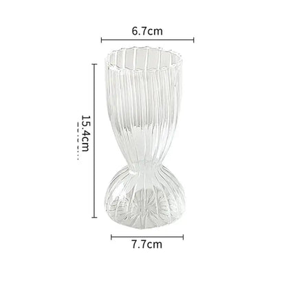 DecorBites™ modern transparent glass vase with vertical ribbed texture and ornate floral base for home decorate root