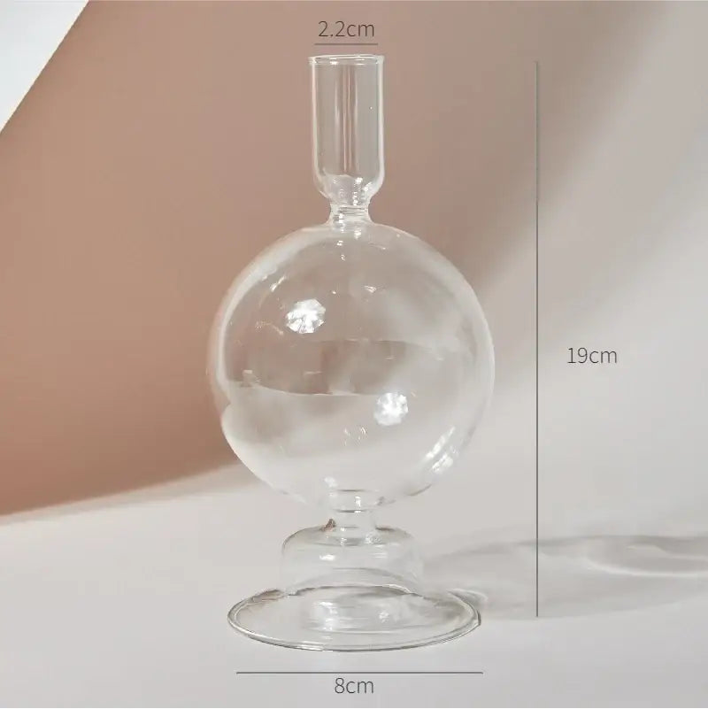 DecorBites™ modern transparent glass vase with spherical body, slender neck, and flared base to decorate root spaces