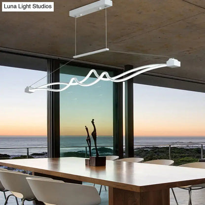 Modern white led island pendant light with sleek wavy design and maximum bulb wattage for dining room use