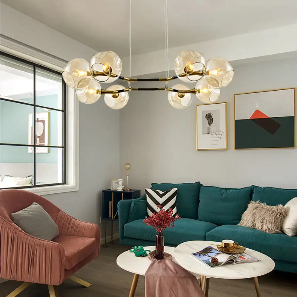 Modern glass globe chandelier pendant light with brass accents for living room by DecorBites™