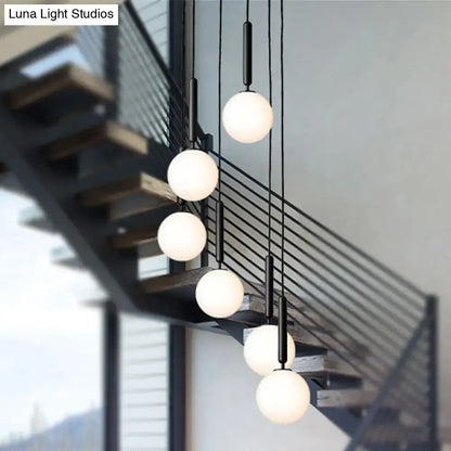 Modern black metal pendant lights with frosted white glass globes and gold finish adjustable inches fixture by decorbites