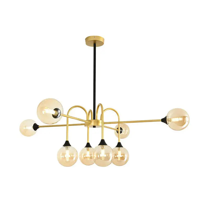 Decorbites modo glass suspension light gold finish with black accents and amber glass bulbs for dining room use