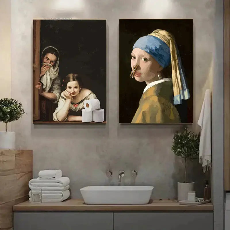 Two framed canvas prints featuring humorous mona lisa bathroom art hang above a bathroom toilet sink by DecorBites™