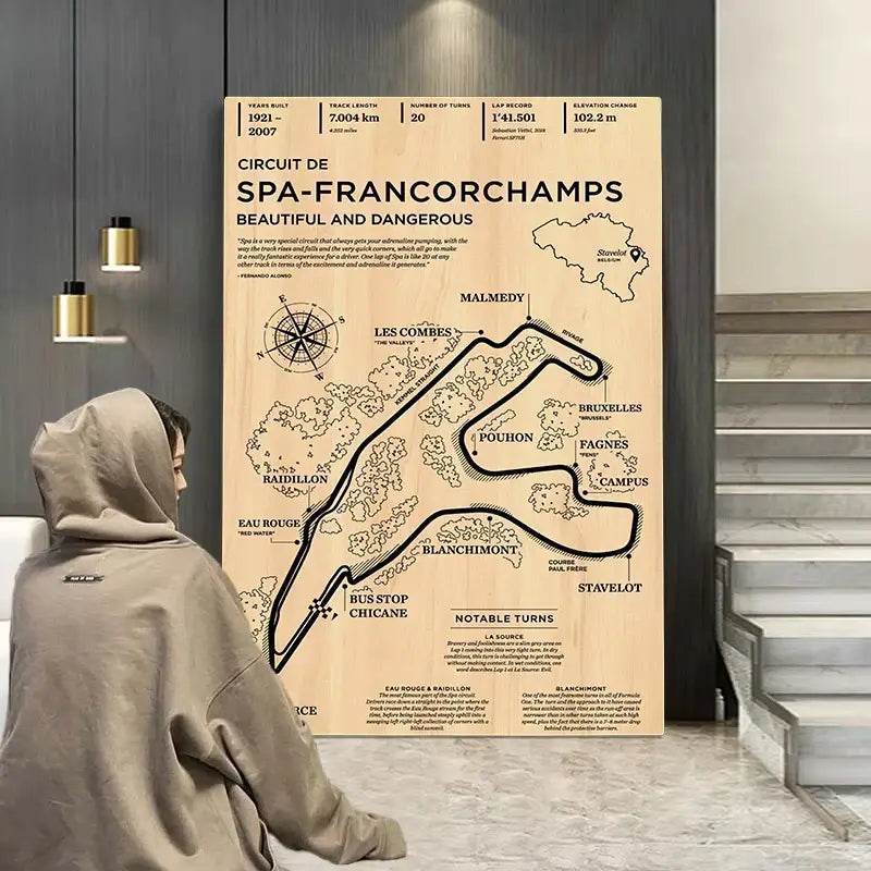 A light wood panel featuring a detailed black line drawing of the monaco grand prix race track with text and markers