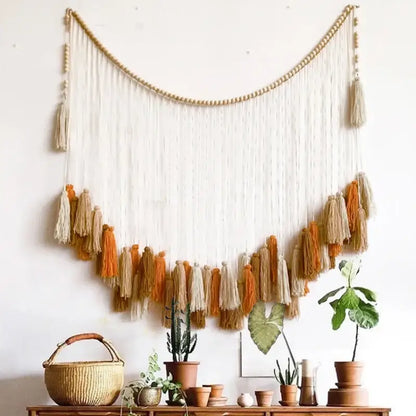 Beige and orange macrame wall decor tapestry with wooden beads and tassels for moroccan bohemian wall decoration