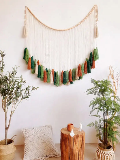 DecorBites moroccan bohemian wall macrame tapestry with curved top, white yarn strands, and green orange beige tassels