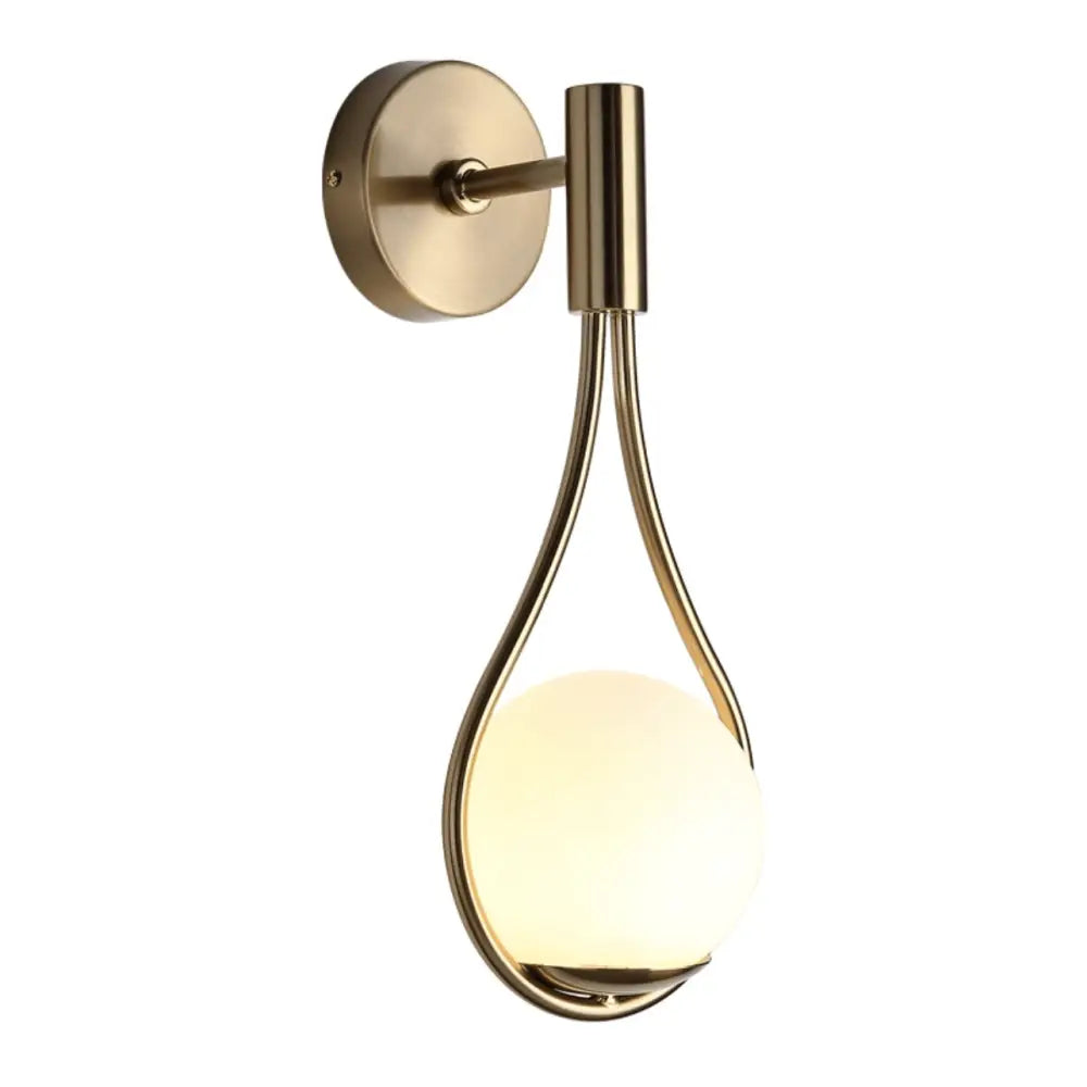 Brass-finished DecorBites™ Moroccan Gold modern nordic wall lamp with teardrop metal frame and glowing glass bulb