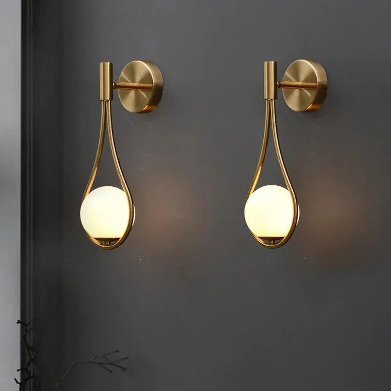 Decorbites™ moroccan gold modern nordic wall lamp with gold-toned metal frame and warm-glowing spherical glass shades