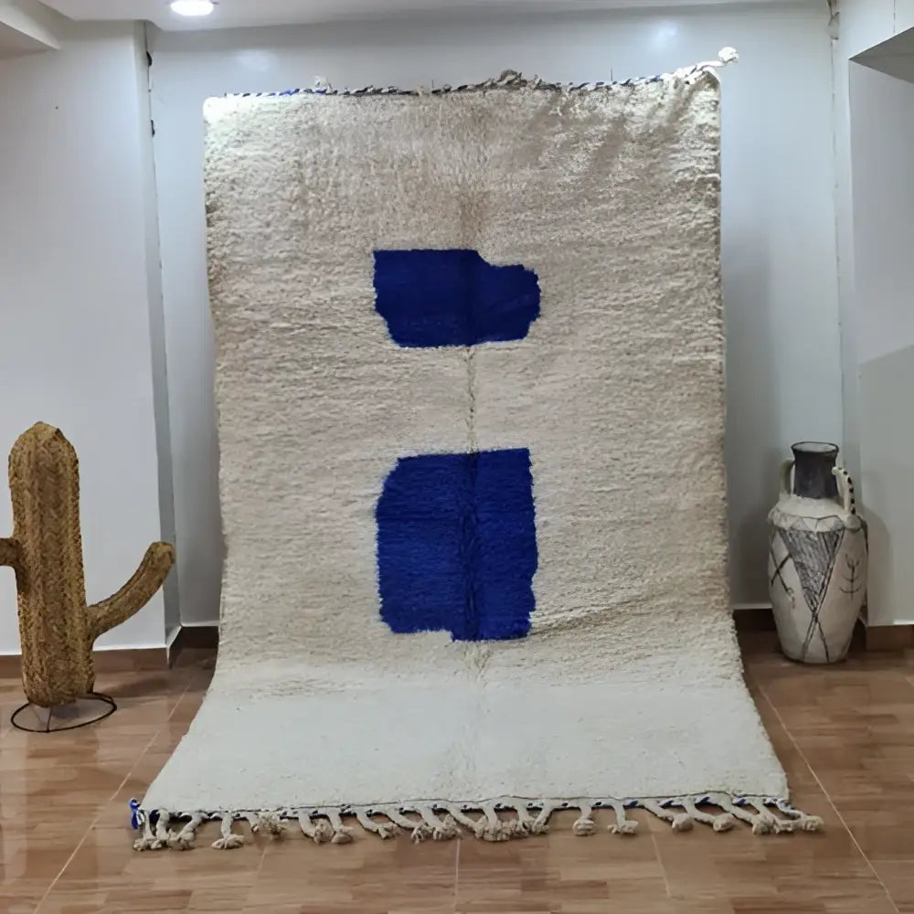 DecorBites™ handcrafted moroccan rug with natural cream background bold blue geometric patterns and fringed edges 2.5m x 1.5m