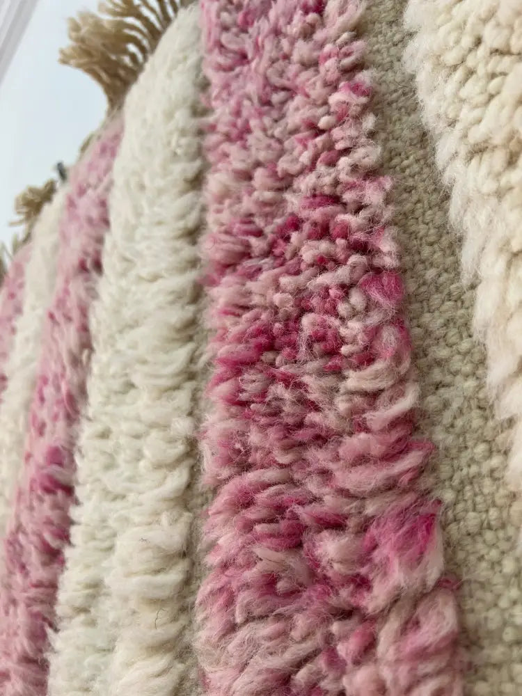 A plush beni ouarain moroccan handmade rug with vertical soft pink and creamy white wool stripes 2.5m by 1.5m