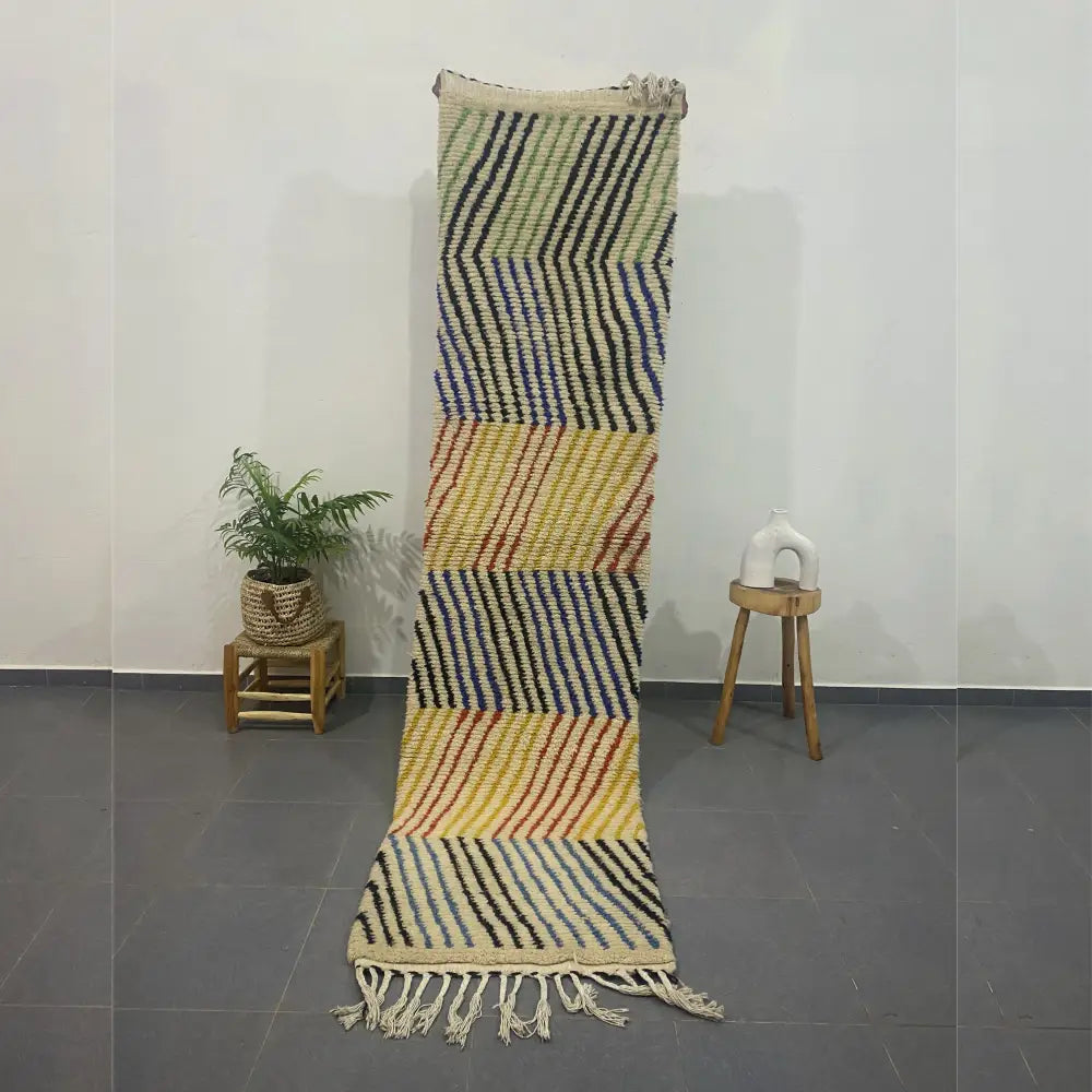 DecorBites™ moroccan handmade beni ouarain rug with colorful geometric pattern in green blue yellow and beige with fringed edges