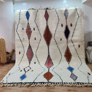Cream-colored decorbites™ moroccan handmade beni ouarain rug with blue rust black and gray geometric diamond patterns 3m x 2m