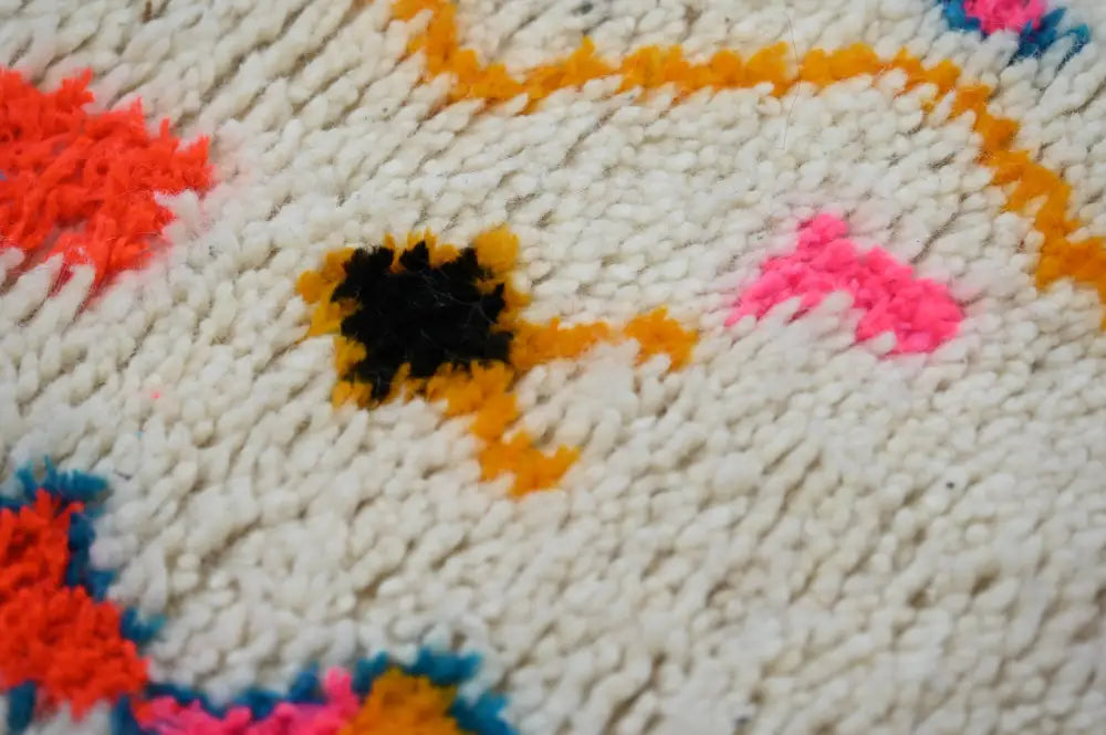 Decorbites moroccan handmade azilal hallway rug with white base and bold orange pink black blue geometric patterns