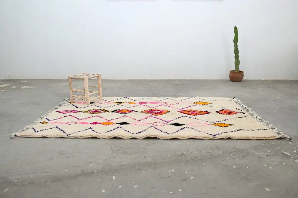 Beige DecorBites™ moroccan handmade traditional azilal rug with vibrant pink orange black geometric patterns and fringed edges