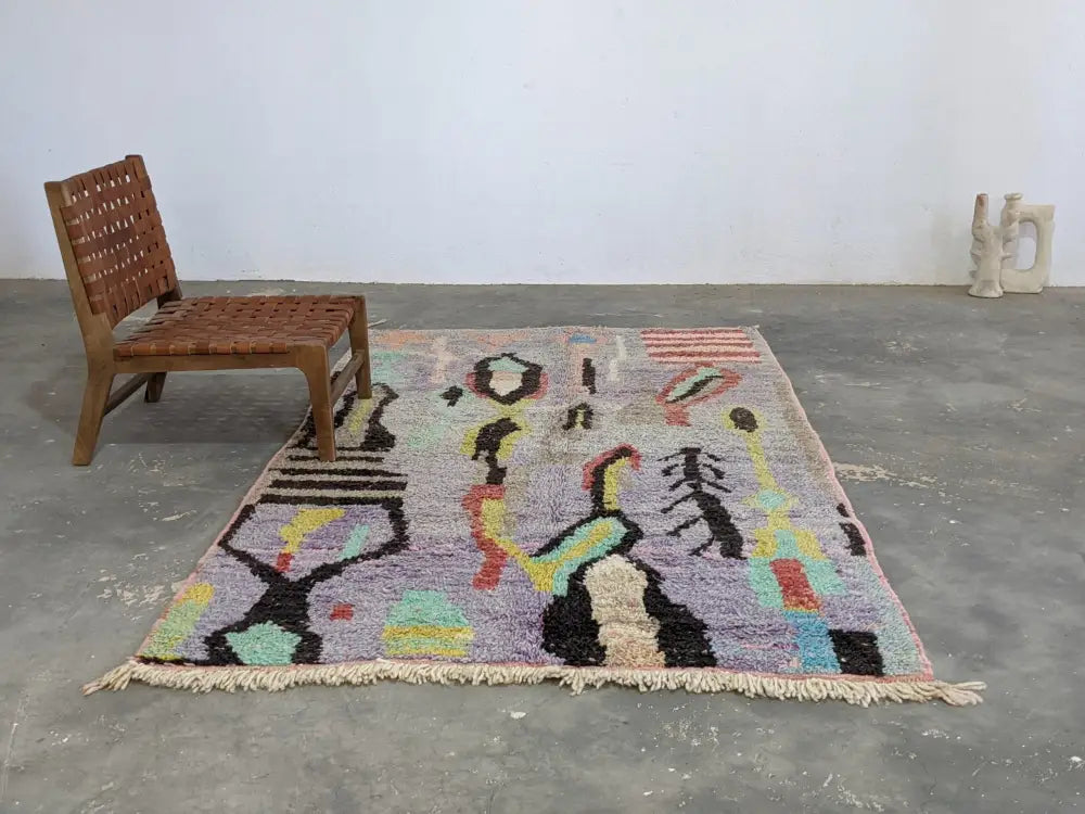 Colorful moroccan handmade azilal rug in pure natural wool with textured weave and fringed edges 252 x 146 cm