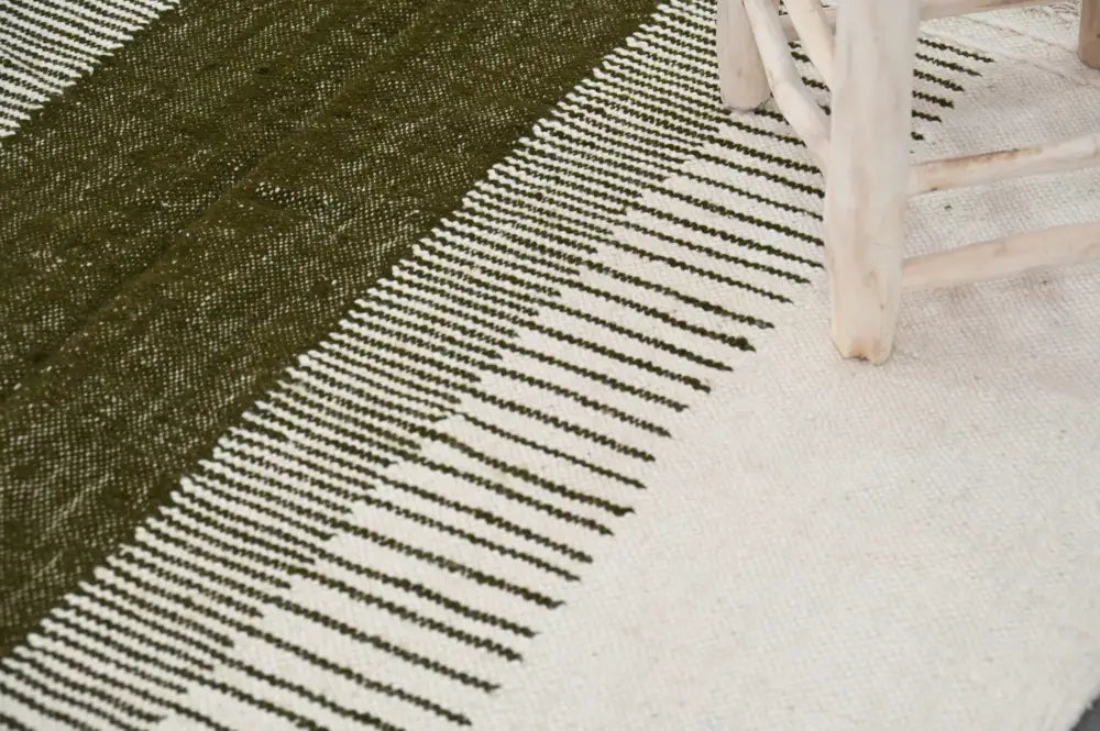 Olive green and cream woven moroccan handmade traditional azilal rug with textured striped pattern by decorbites