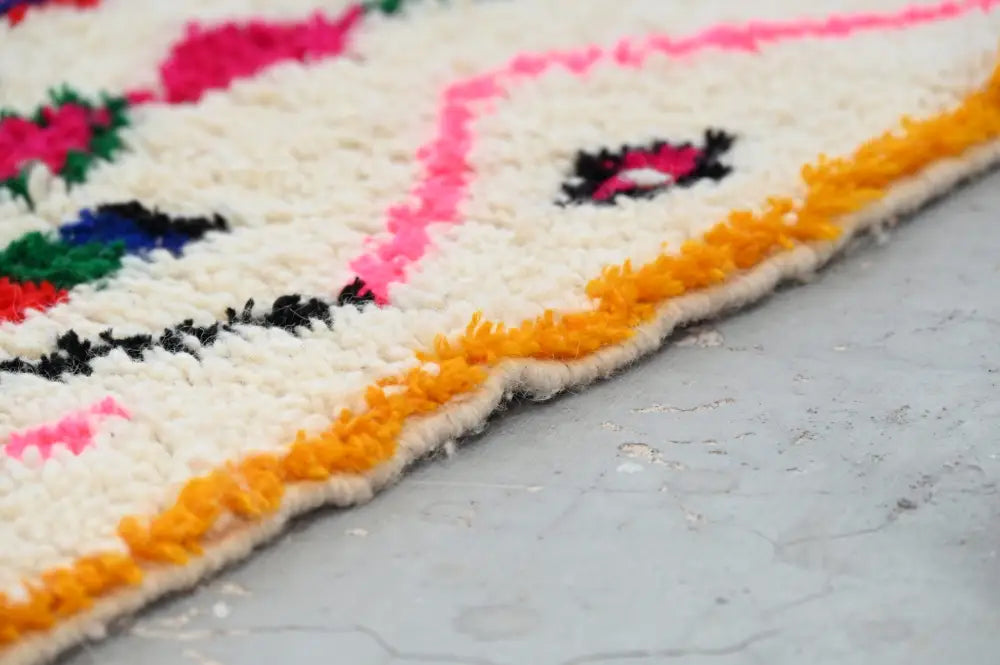 DecorBites™ moroccan handmade traditional azilal rug with cream base and bold geometric patterns in multiple colors