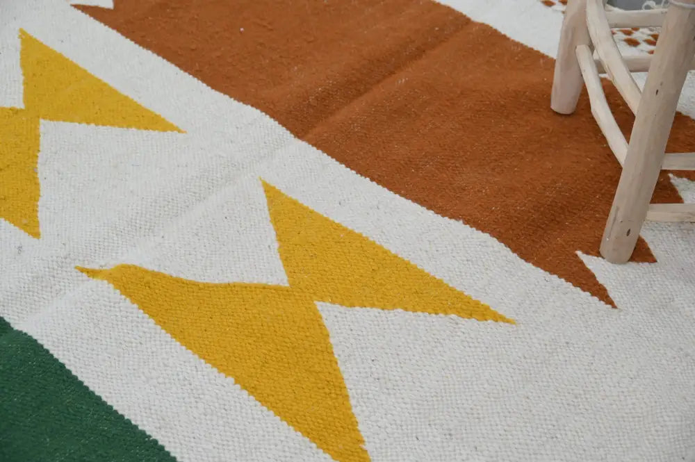 DecorBites moroccan handmade traditional azilal rug with bold geometric patterns in white mustard yellow terracotta and green