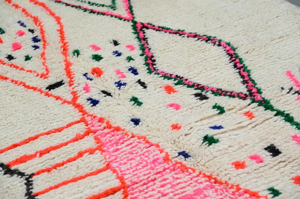 Decorbites™ moroccan handmade traditional azilal rug with cream base and bold pink orange green blue black geometric patterns