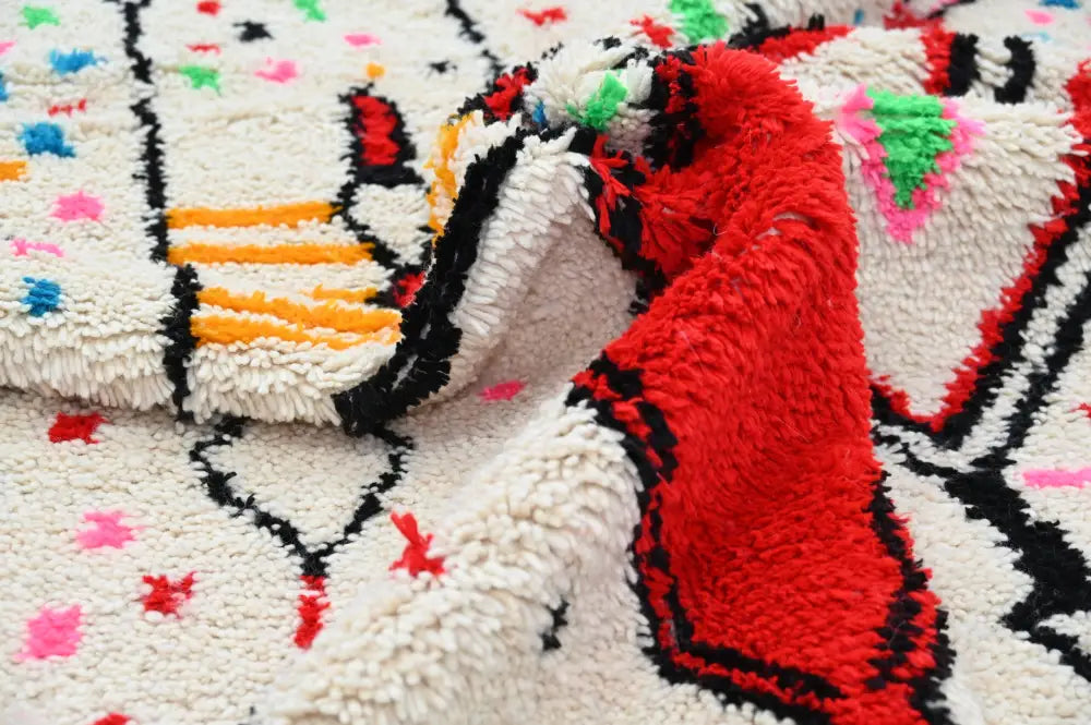 DecorBites™ moroccan handmade traditional azilal rug with cream base and bold geometric patterns in multiple colors