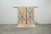 Beige moroccan handmade traditional azilal rug with yellow green brown geometric patterns by decorbites