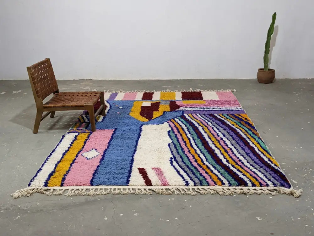 DecorBites™ moroccan handmade traditional azilal rug with bold pink, blue, yellow, purple, and white wool stripes and blocks