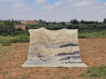 Beige and gray striped beni mrirt rug with textured hand-knotted design from decorbites moroccan handmade collection