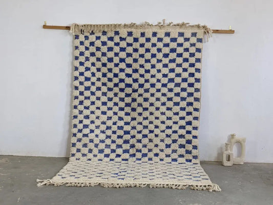 Decorbites moroccan handmade beni ouarain rug with blue and cream checkered pattern and fringed edges 260 x 170 cm