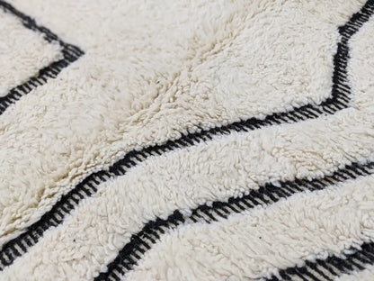 Cream-colored plush wool beni ouarain rug with bold black geometric stripes moroccan handmade 285 x 194 cm