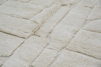 Off-white plush moroccan handmade beni ouarain rug with a textured blocky pattern by DecorBites 285 x 210 cm