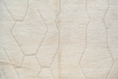 Cream-colored plush wool beni ouarain rug with subtle geometric stitched hexagons moroccan handmade design