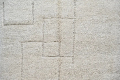 Beige textured beni ouarain rug with subtle geometric pattern woven into its surface by DecorBites™ 307 x 205 cm